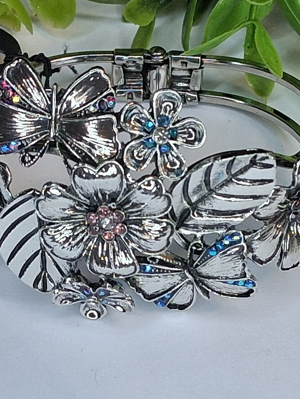 Floral And Butterfly Bracelet with Multi-color Iridescent Blue and Pink Accents